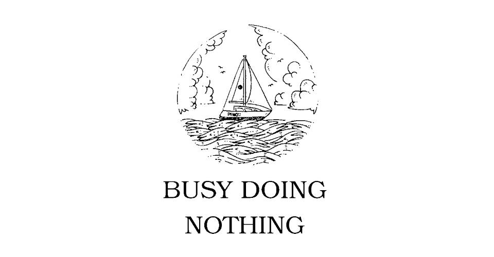 cover of busy doing nothing featuring a sailboat sailing over rabbit-shaped waves