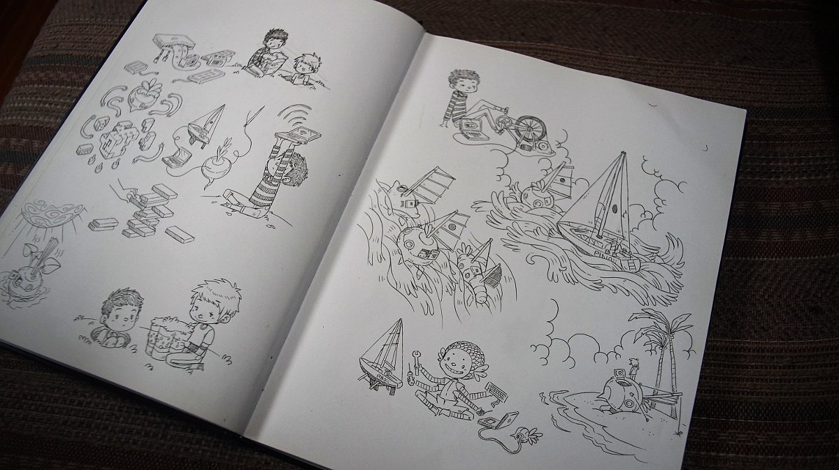 a photo of inked drawings in a sketchbook