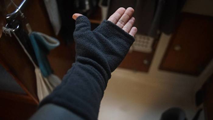 the inside of reks hand covered by an armwarmer